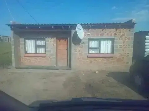 2 roomed house on a very big site with enormous opportunities for future development and immediate chance to regain money spent on the property. Ntlo e Ha Makhoathi about 2mins to the Main Road